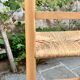 Old wooden and straw high chair for children