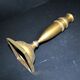 Antique baluster candlestick in bronze with hand-chiseled design.