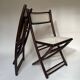 Set de quatre chaises pliantes en bois et cannage