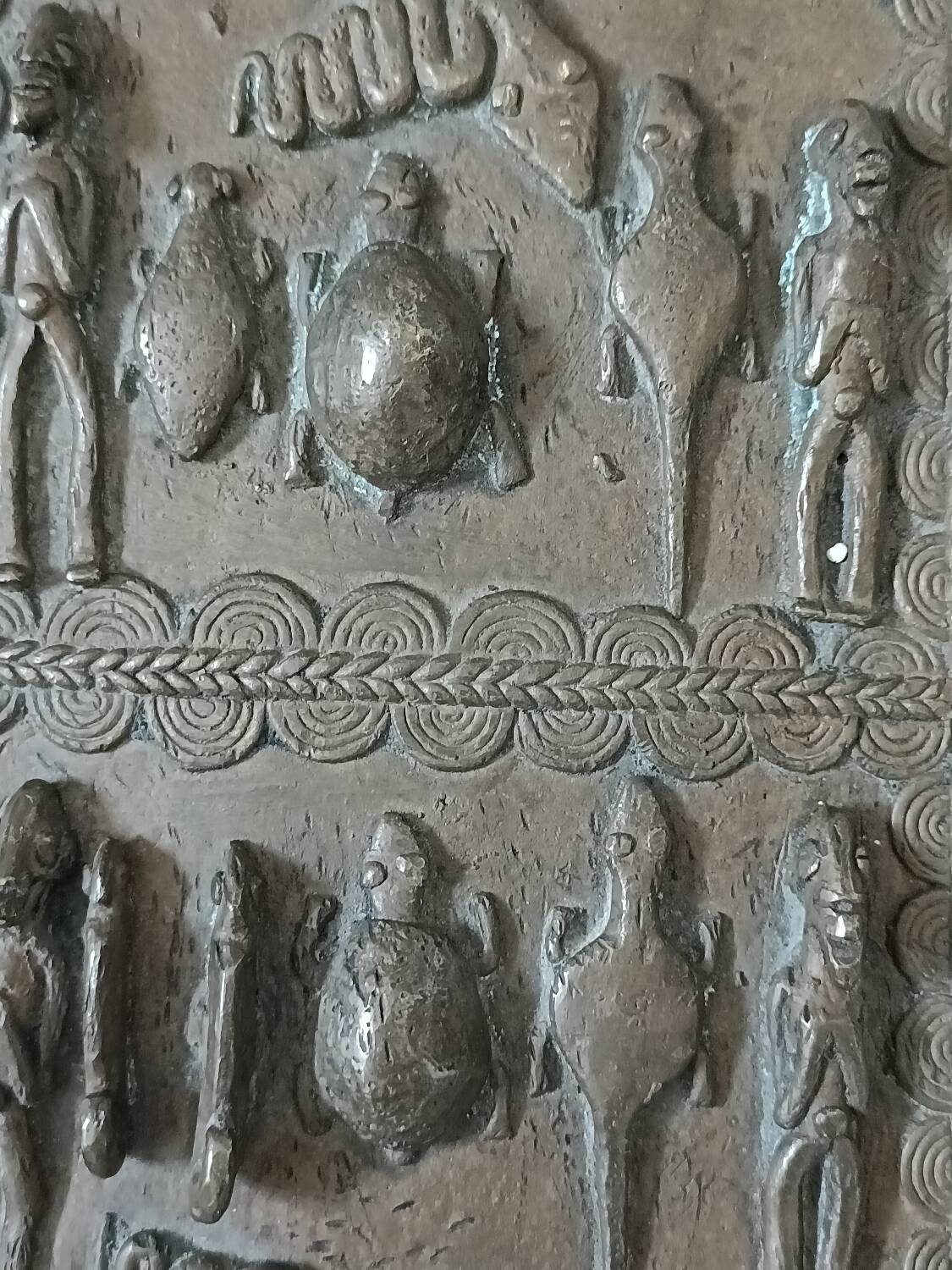 Antique small Dogon bronze door