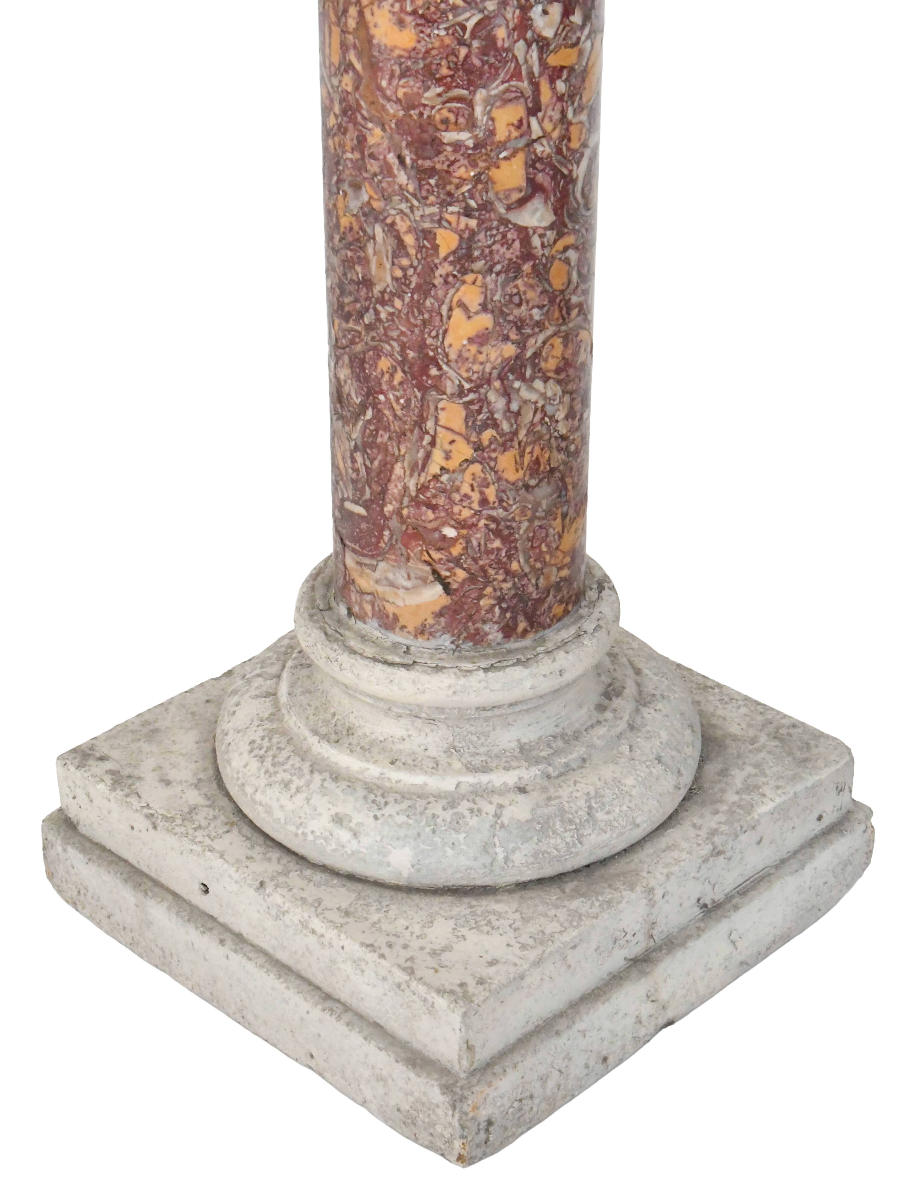 Pair of Brocatelle marble columns and stone with Corinthian capitals.