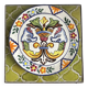 Decorative ceramic plate with griffins