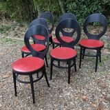 6 vintage Baumann seagull model chairs, black lacquered with red Skai seats.