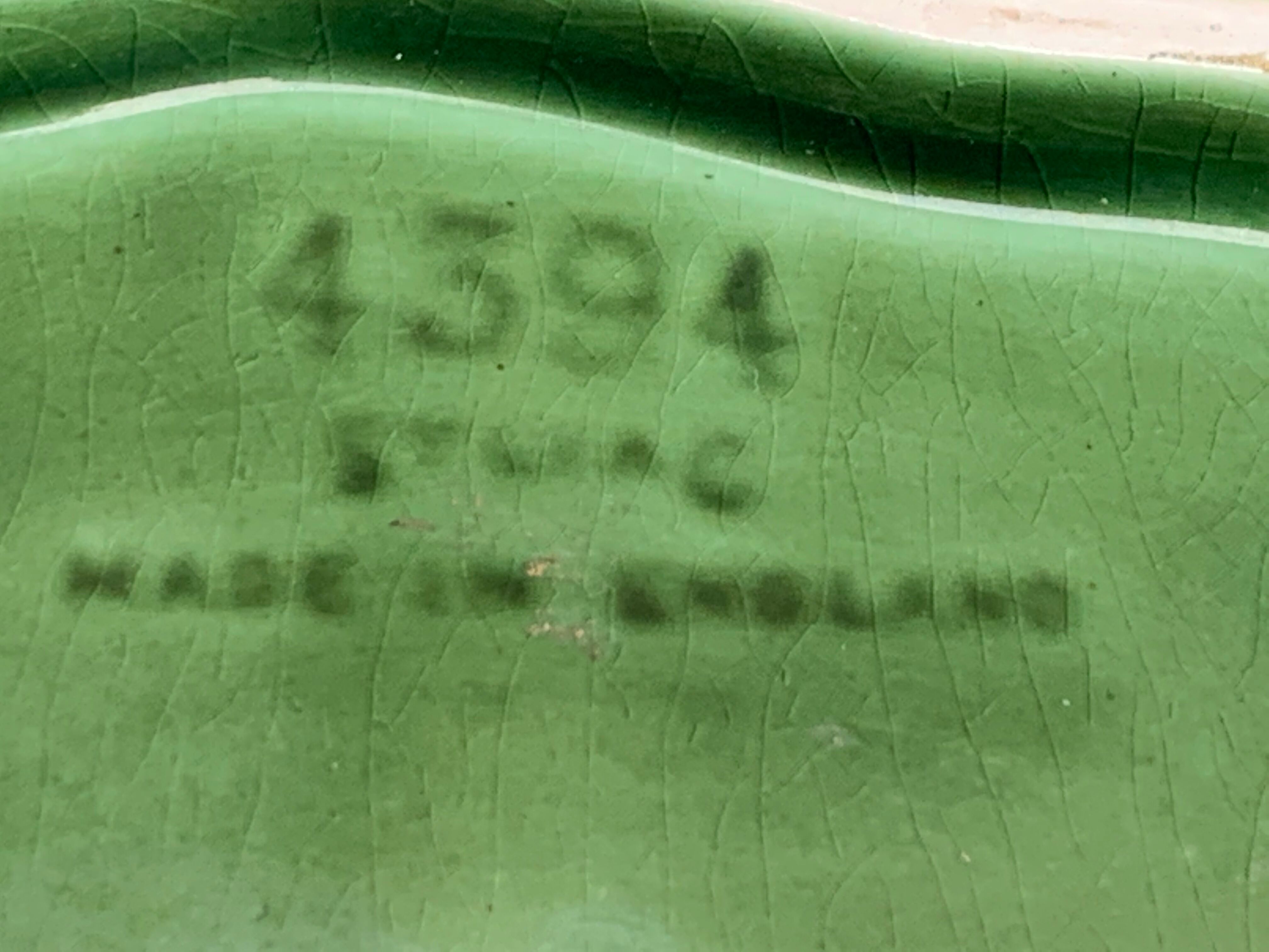 Pot cover in ceramic slurry glazed green pattern foliage and swan made in england numbered