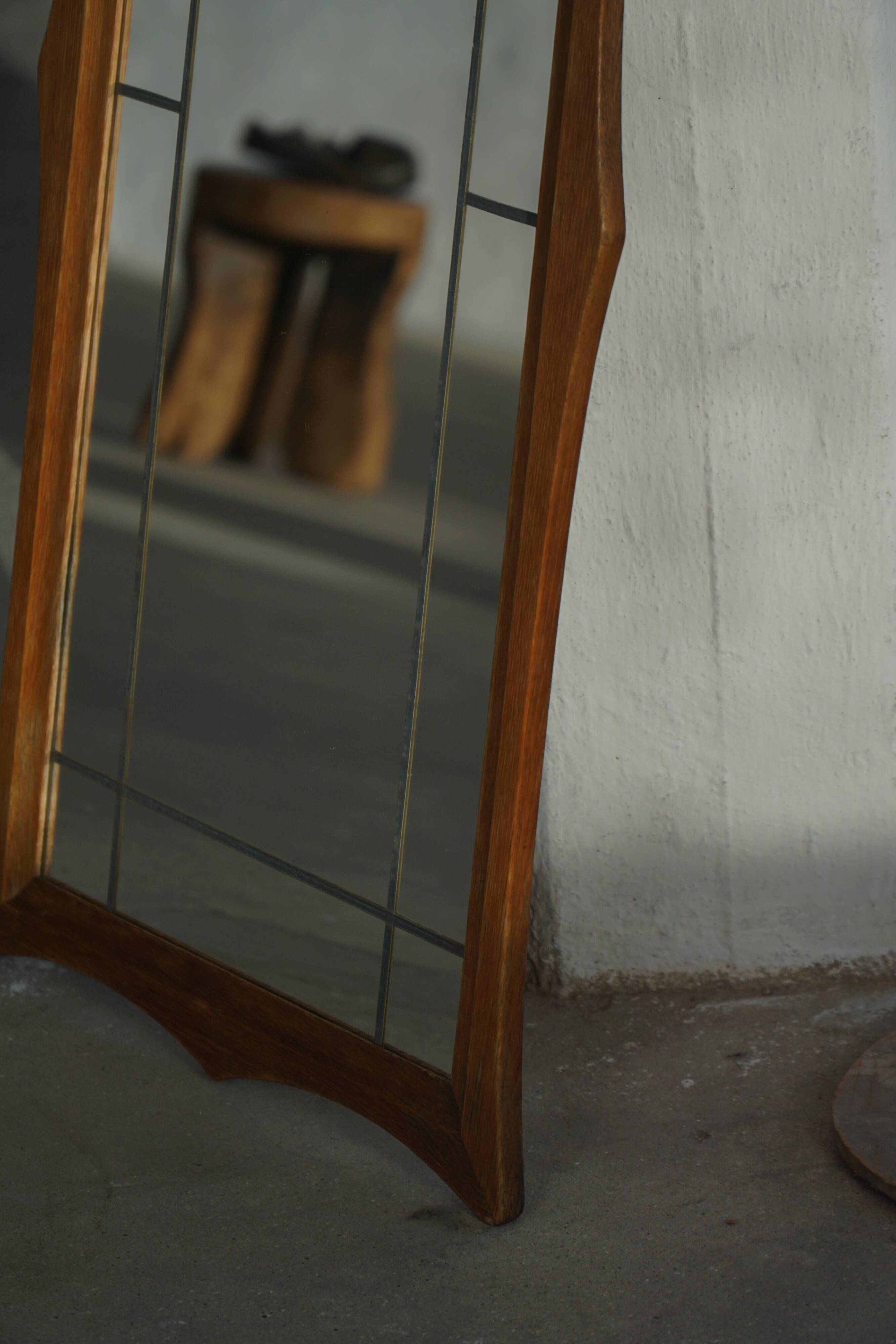 Danish wall mirror in solid oak from the mid-20th century, Scandinavian modern design.