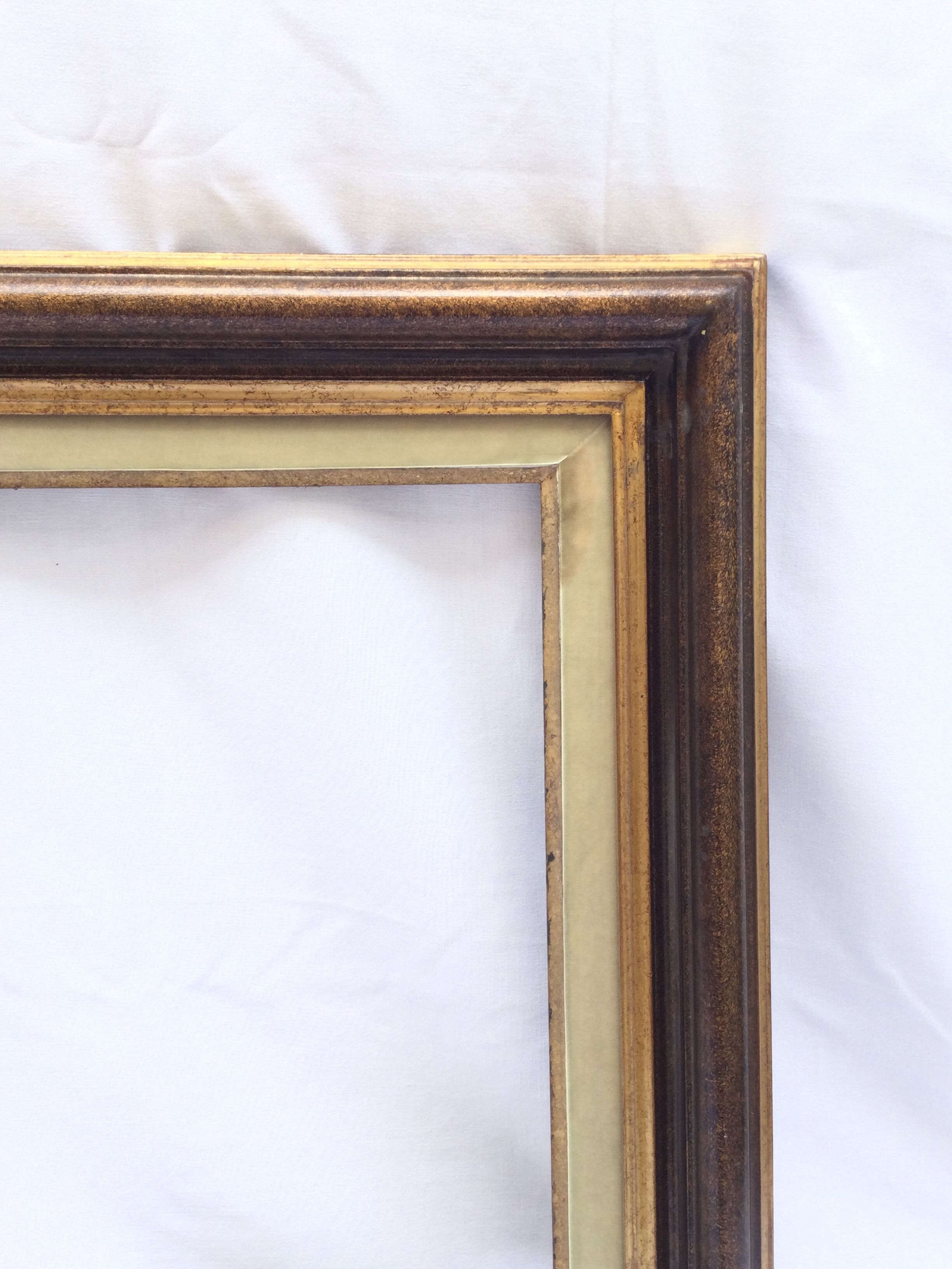 Gilded wooden frame and fabric