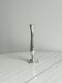 Small single-stem vase in lightweight metal