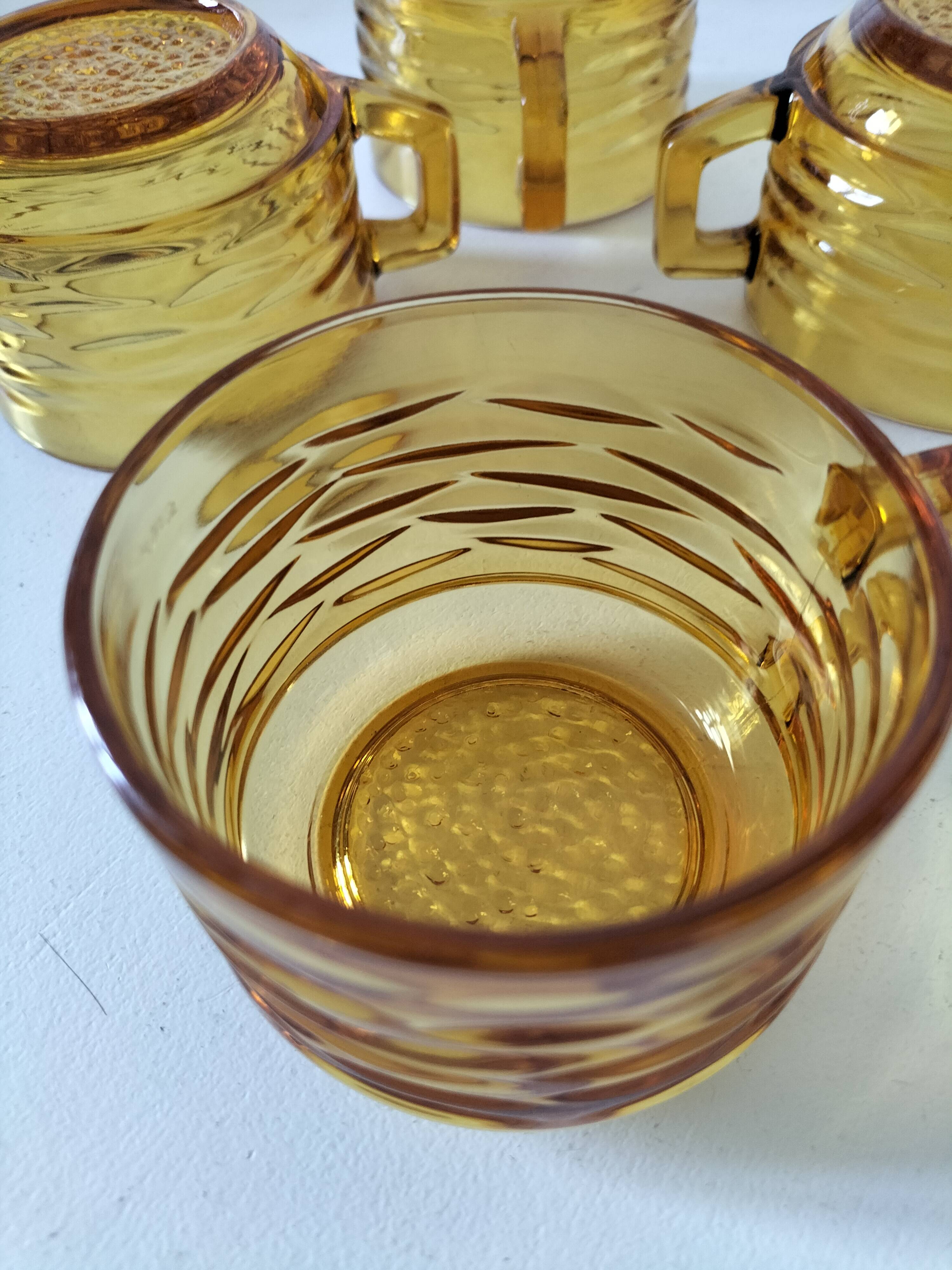 Set of 4 vintage amber glass mugs with textured 70s design