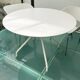 4 Tom Vac chairs designed by Ron Arad with a white round table of 110cm.