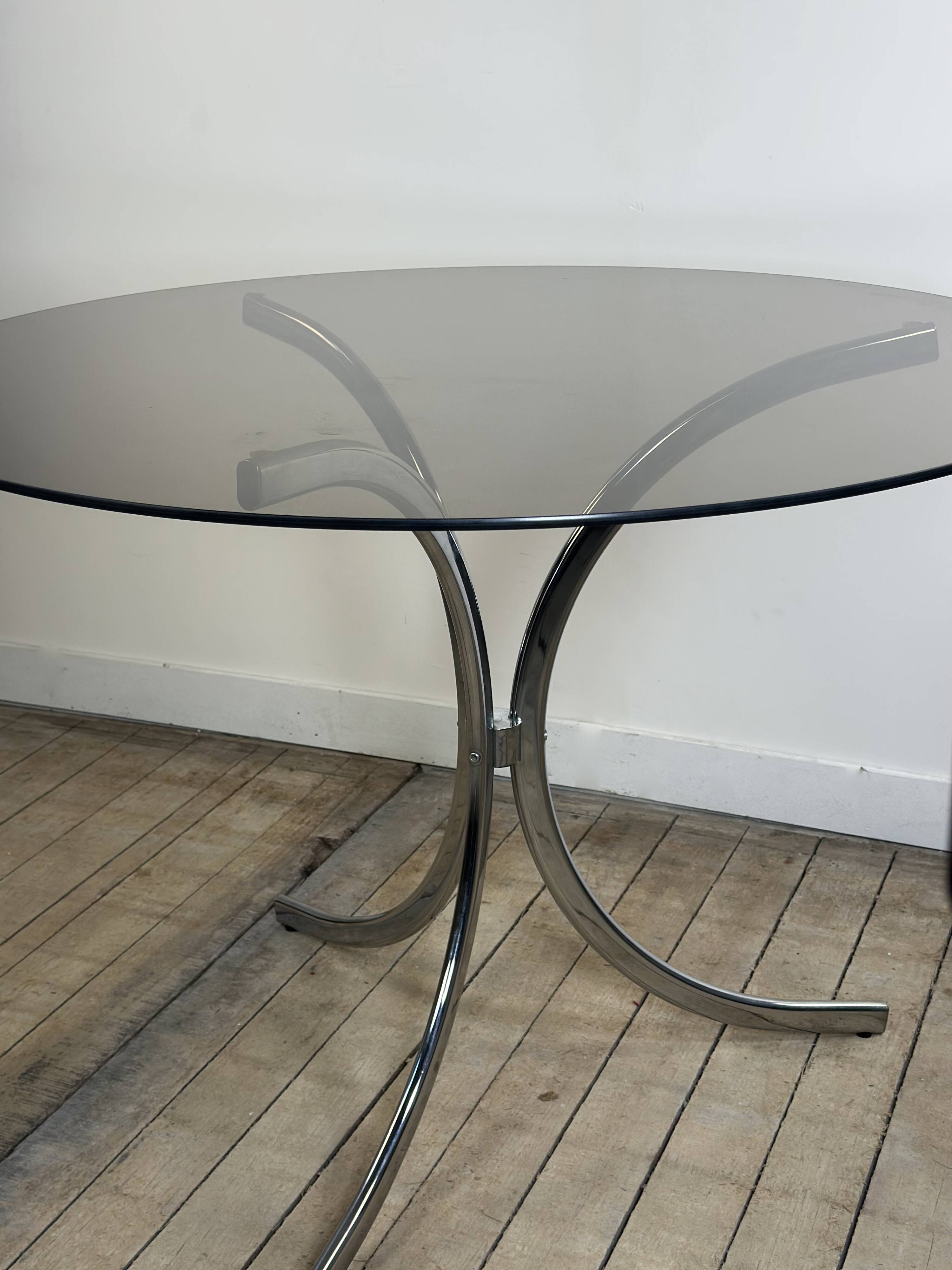 Vintage 1970s round metal and smoked glass table