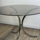 Vintage 1970s round metal and smoked glass table