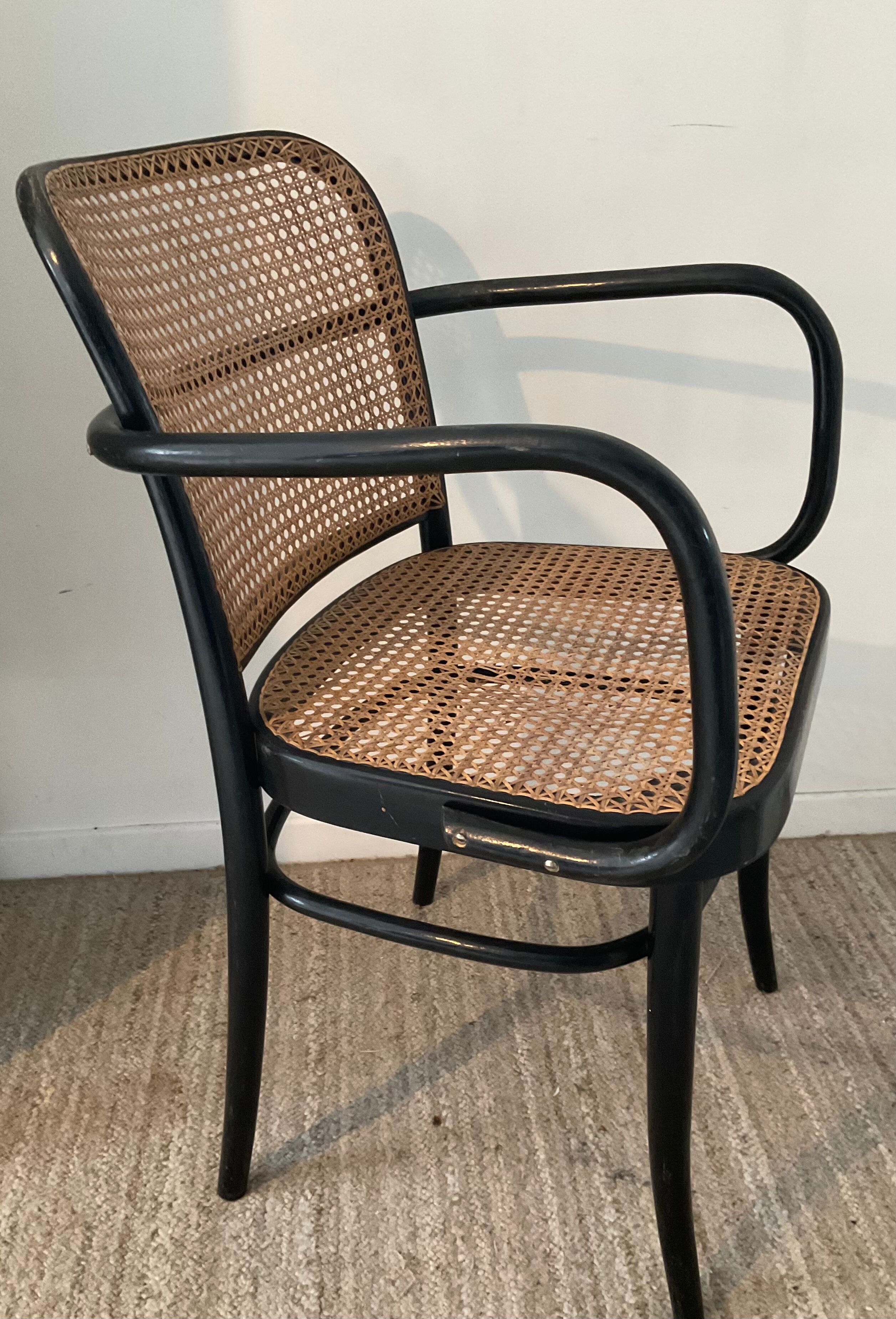 Canned bistro armchair and curved wood from the 60s