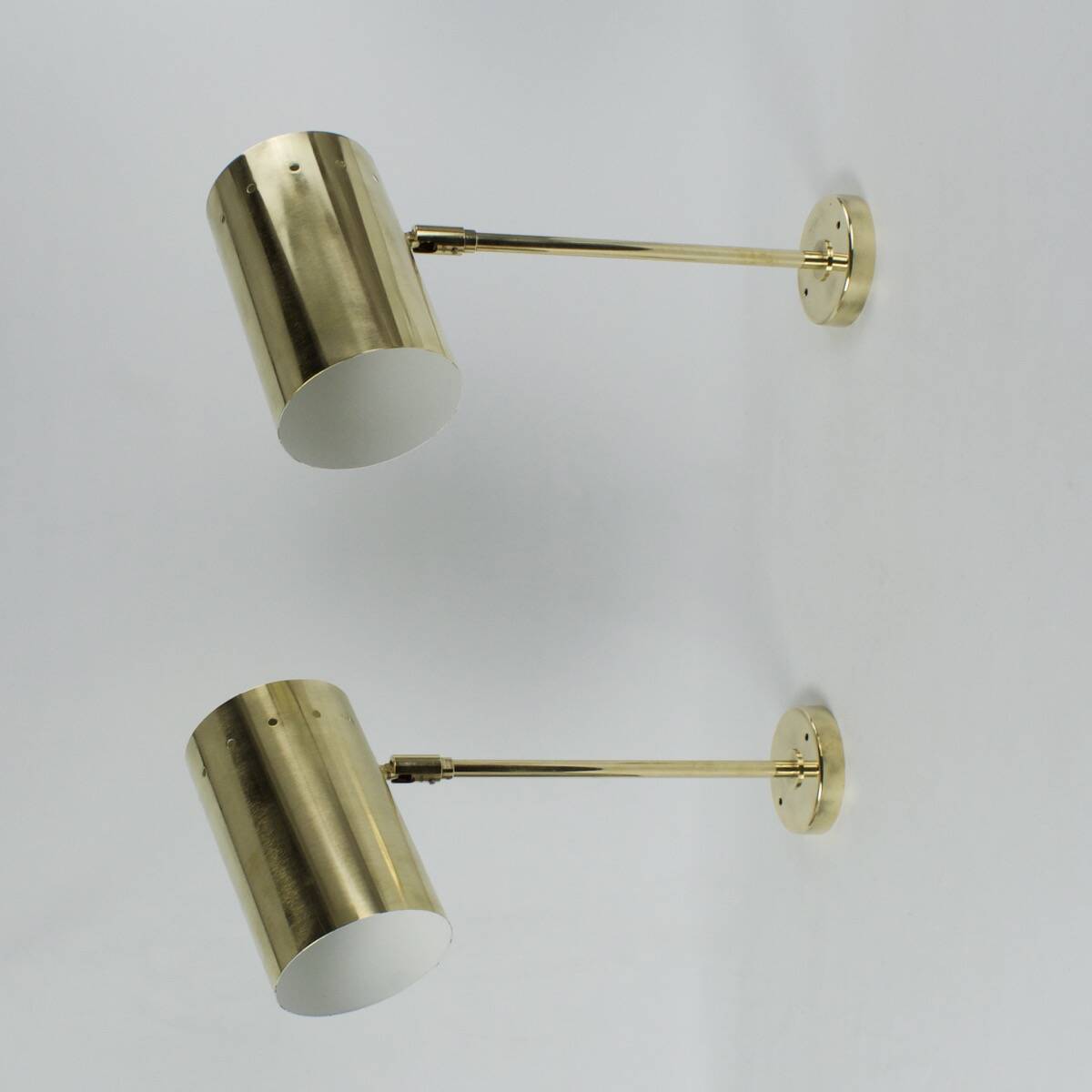 Large pair of brass wall or ceiling lights, 1960.