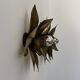 Pair of vintage patinated brass wall lights with floral motif, France, 1960.