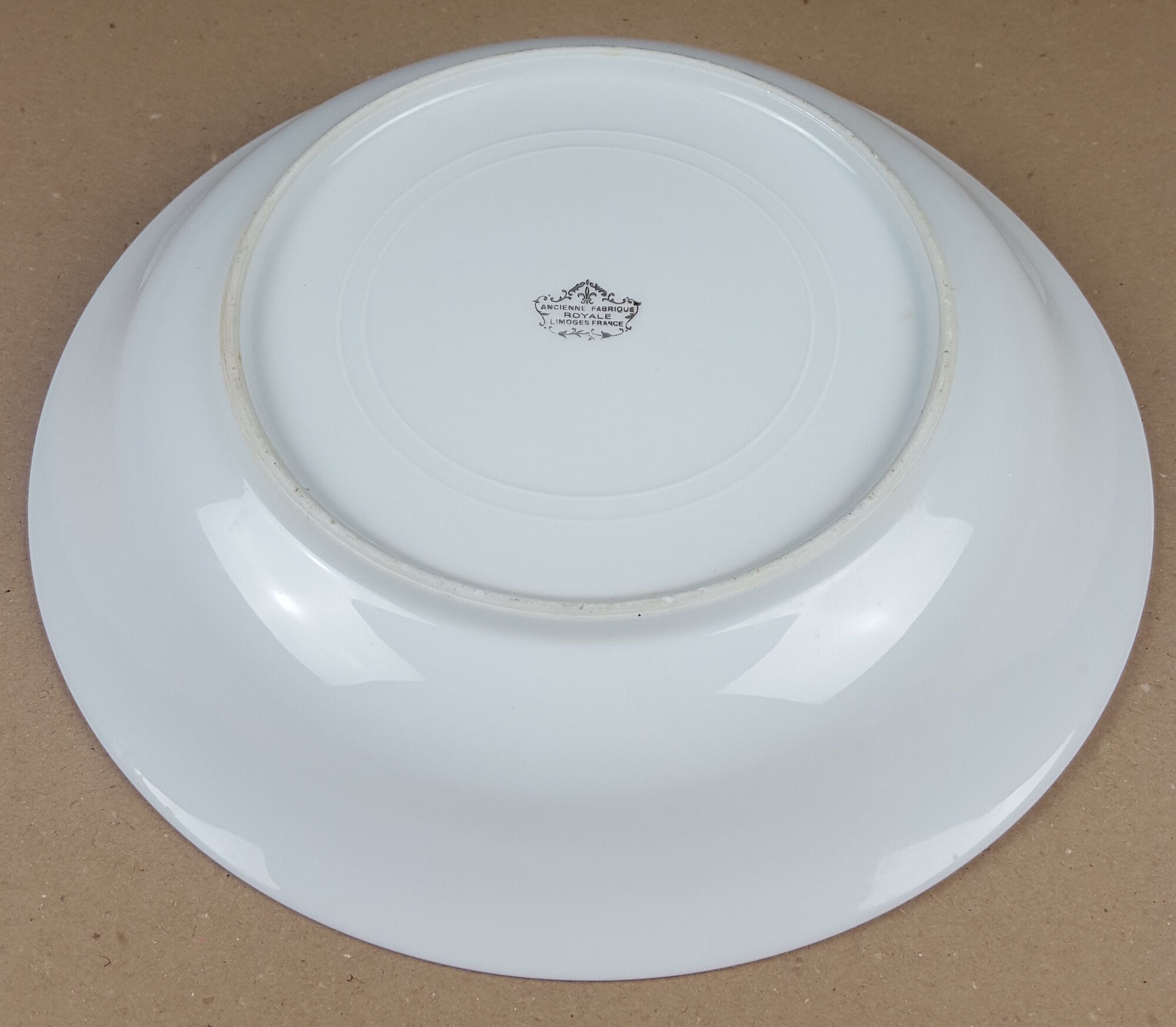 Large round porcelain dish Limoges France gilding gold edging