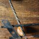 Double wrought iron coat rack with 3 double wooden ball hooks