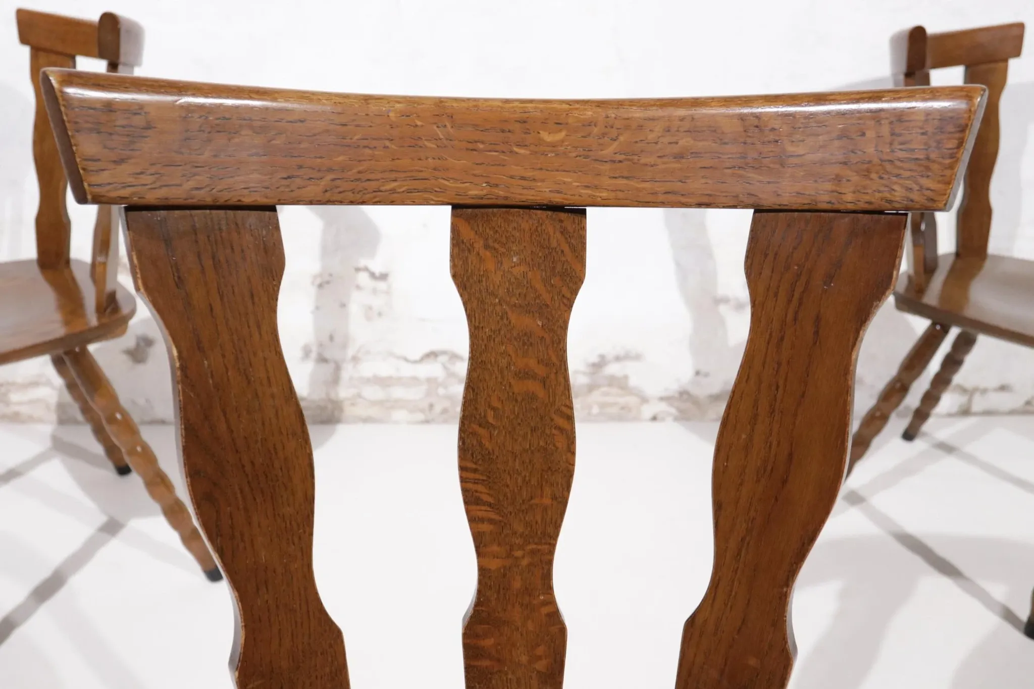 Set of 3 brutalist chairs with arched cut-outs and turned legs