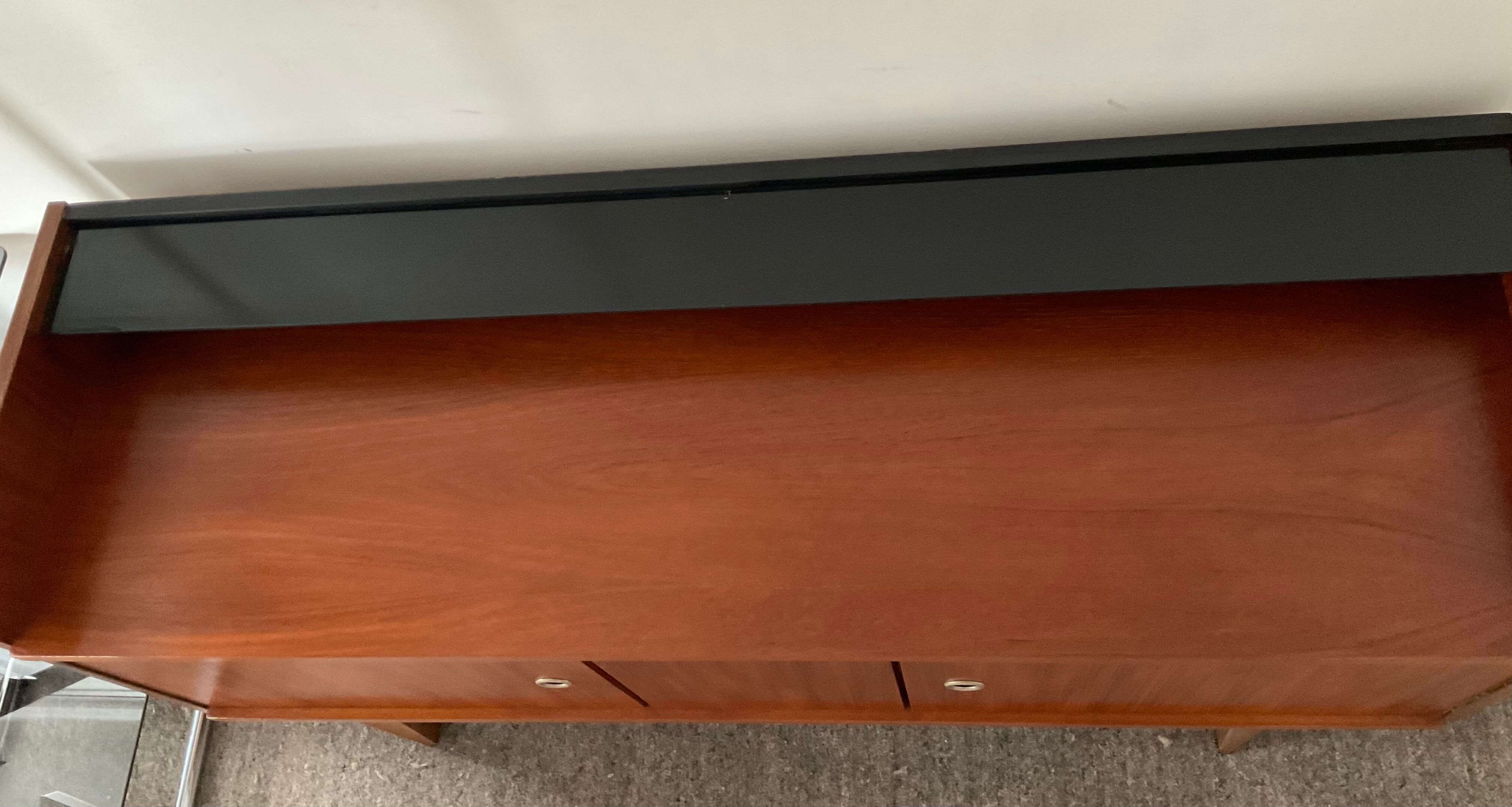 Scandinavian teak row from the 60s