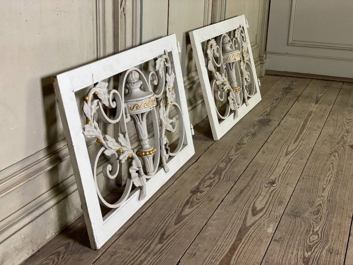 Pair of cast iron window shutters in Louis XVI style.