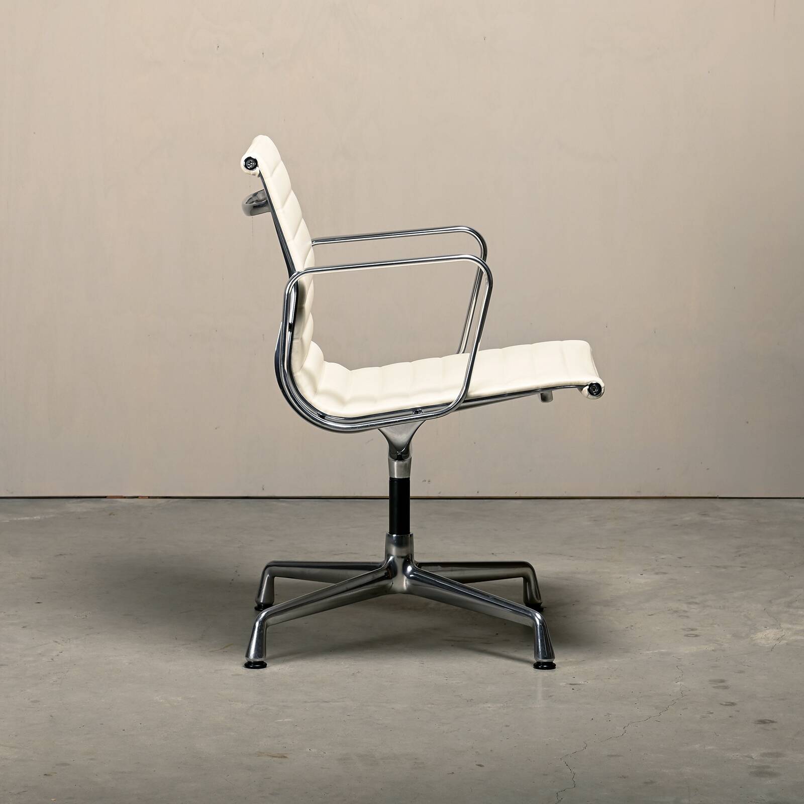Charles & Ray Eames EA108 Dining Chair in Polished Aluminum and White leath