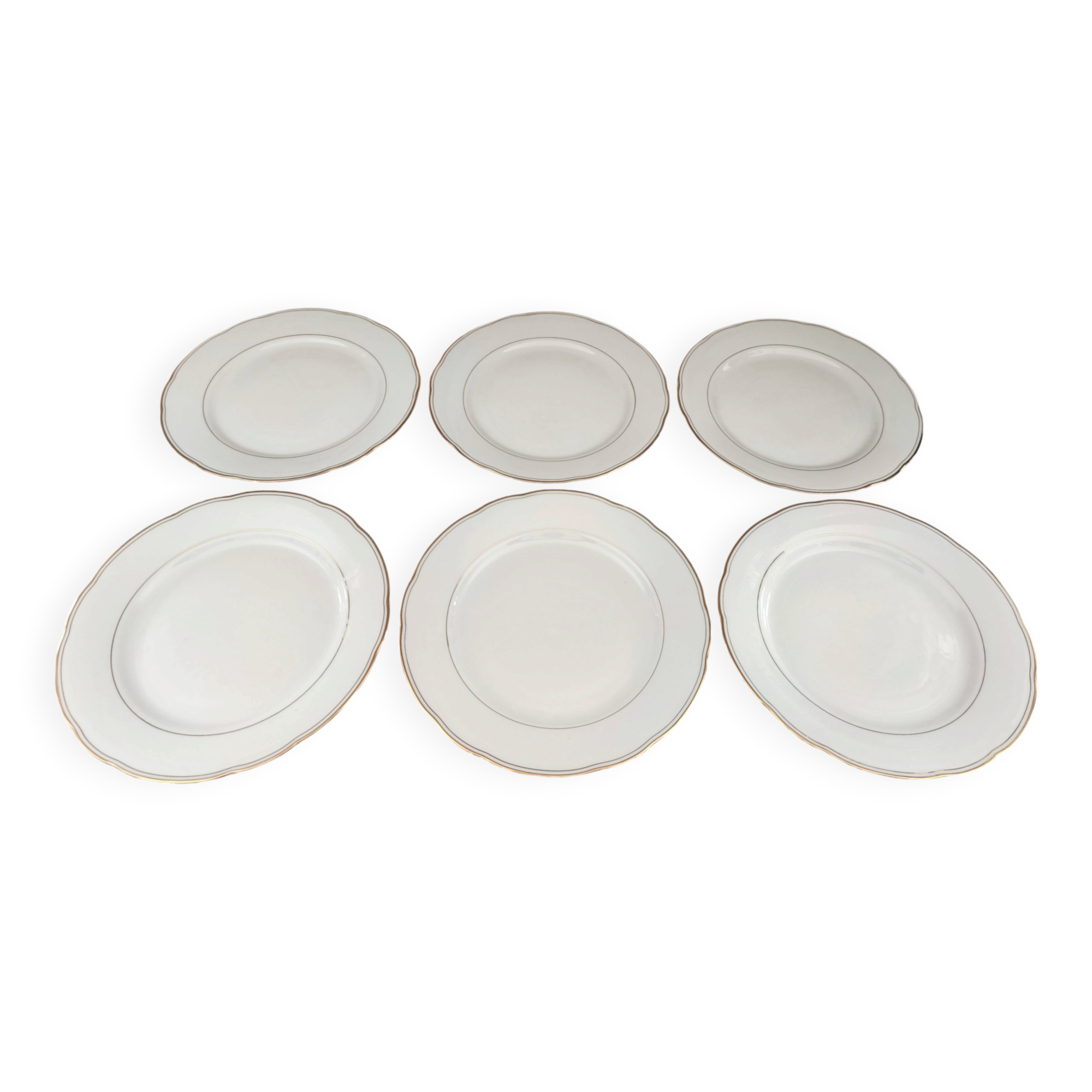 Set of 6 flat plates in fine white Bohemian porcelain with a gold rim.