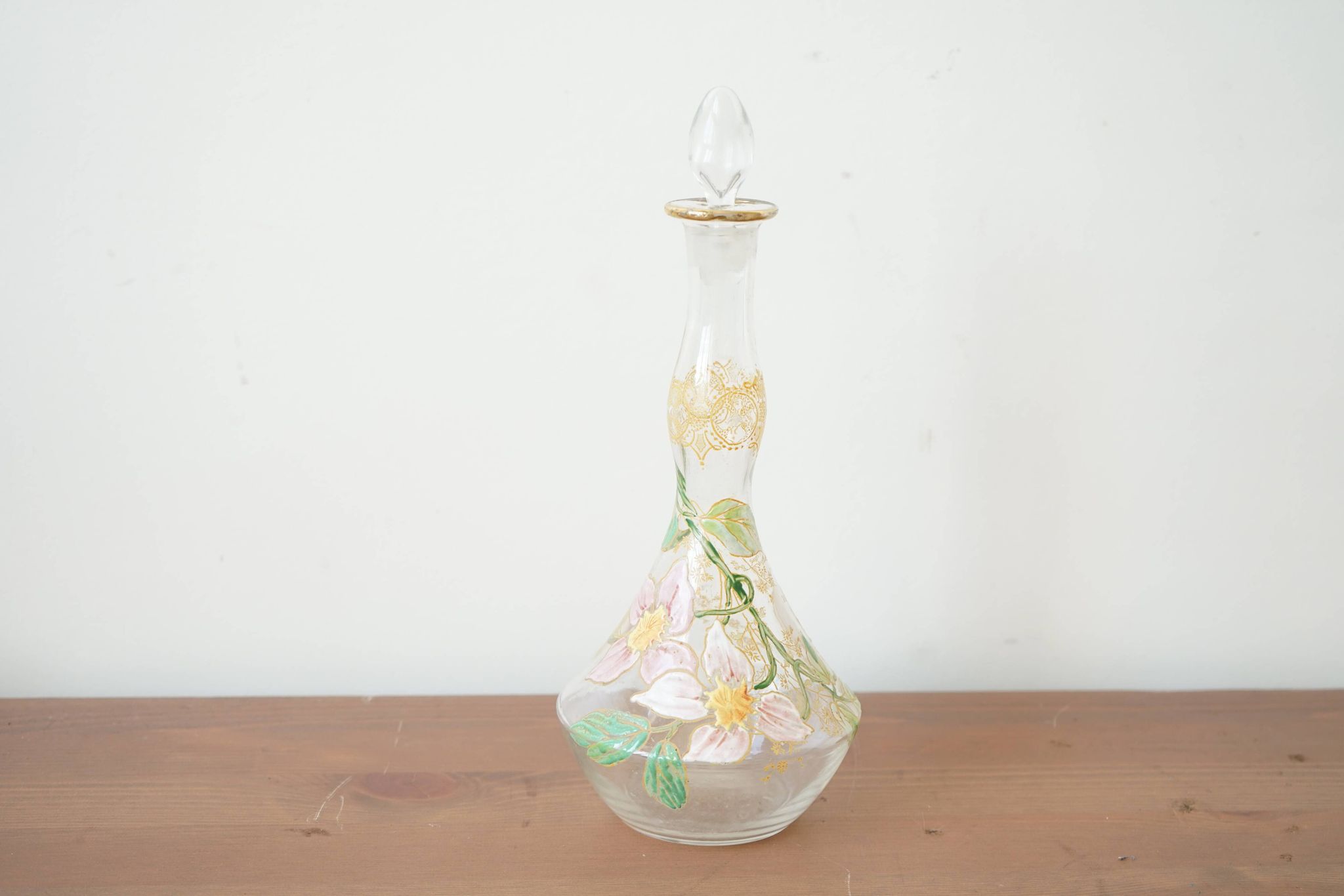 Legras (late 19th century) liqueur carafe in enamelled glass with floral decoration.