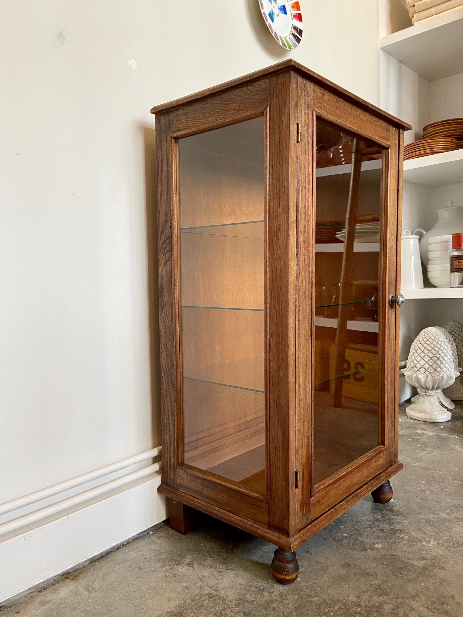 Dark wood display case and transparent glass