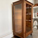 Dark wood display case and transparent glass