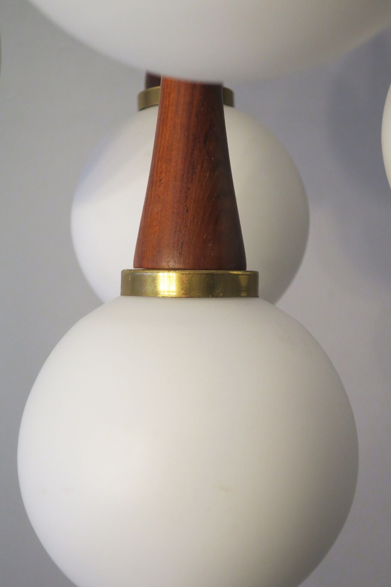 Danish brass and teak cascading 5-globe chandelier, 1960