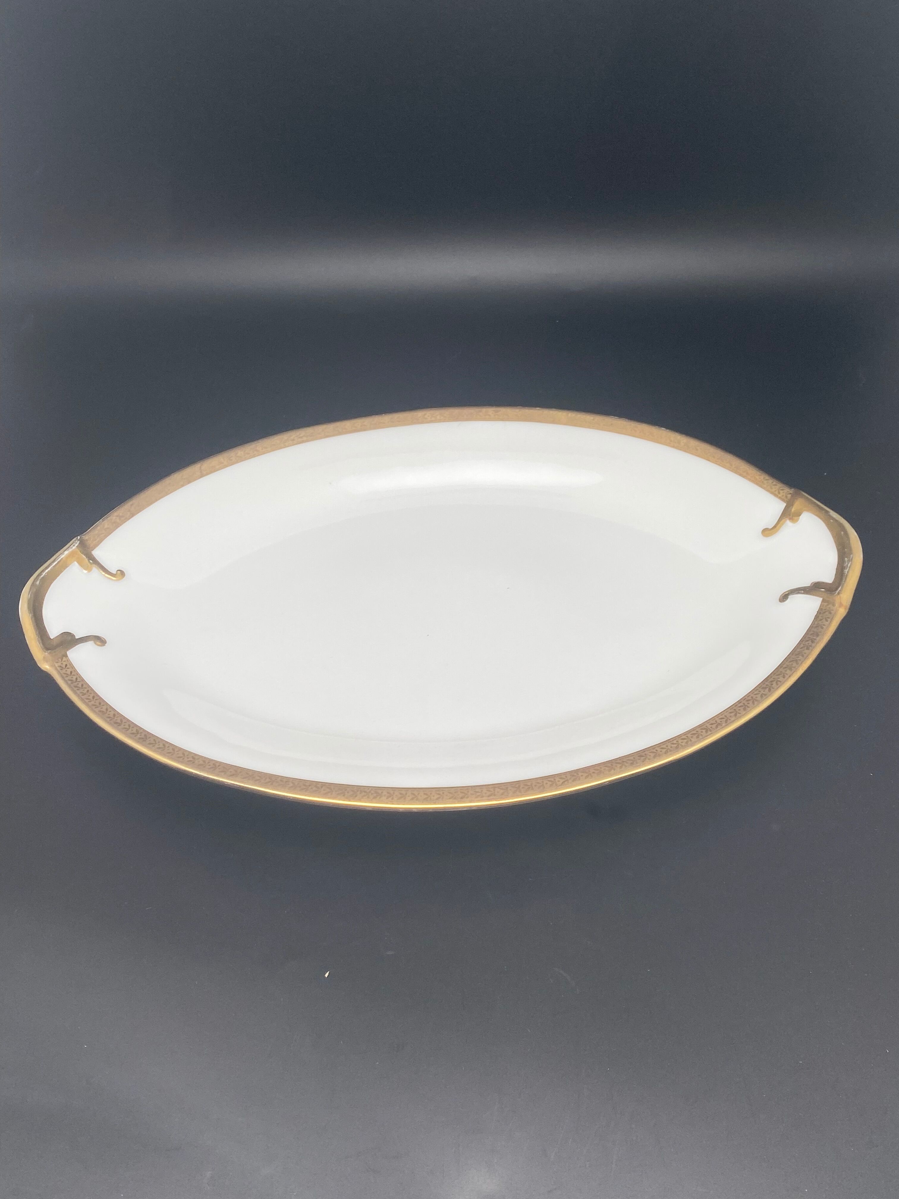 Oval flat Limoges golden tower