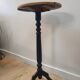 Black and wood pedestal table