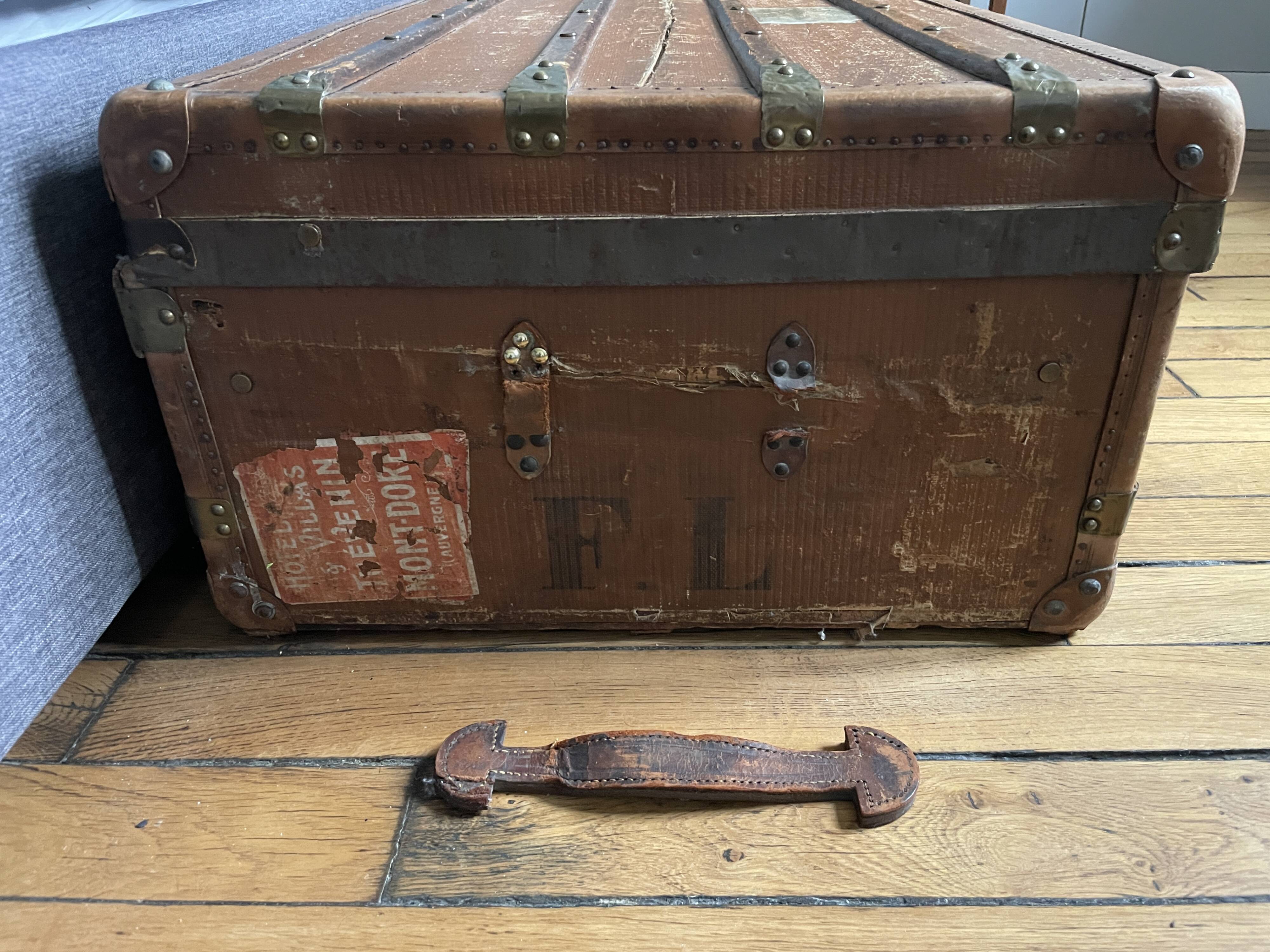Large antique trunk with a key closure.