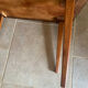 Mid-century coffee table with tapered legs.