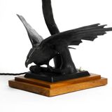 1940s table lamp made of iron in the shape of an eagle, teak wooden base