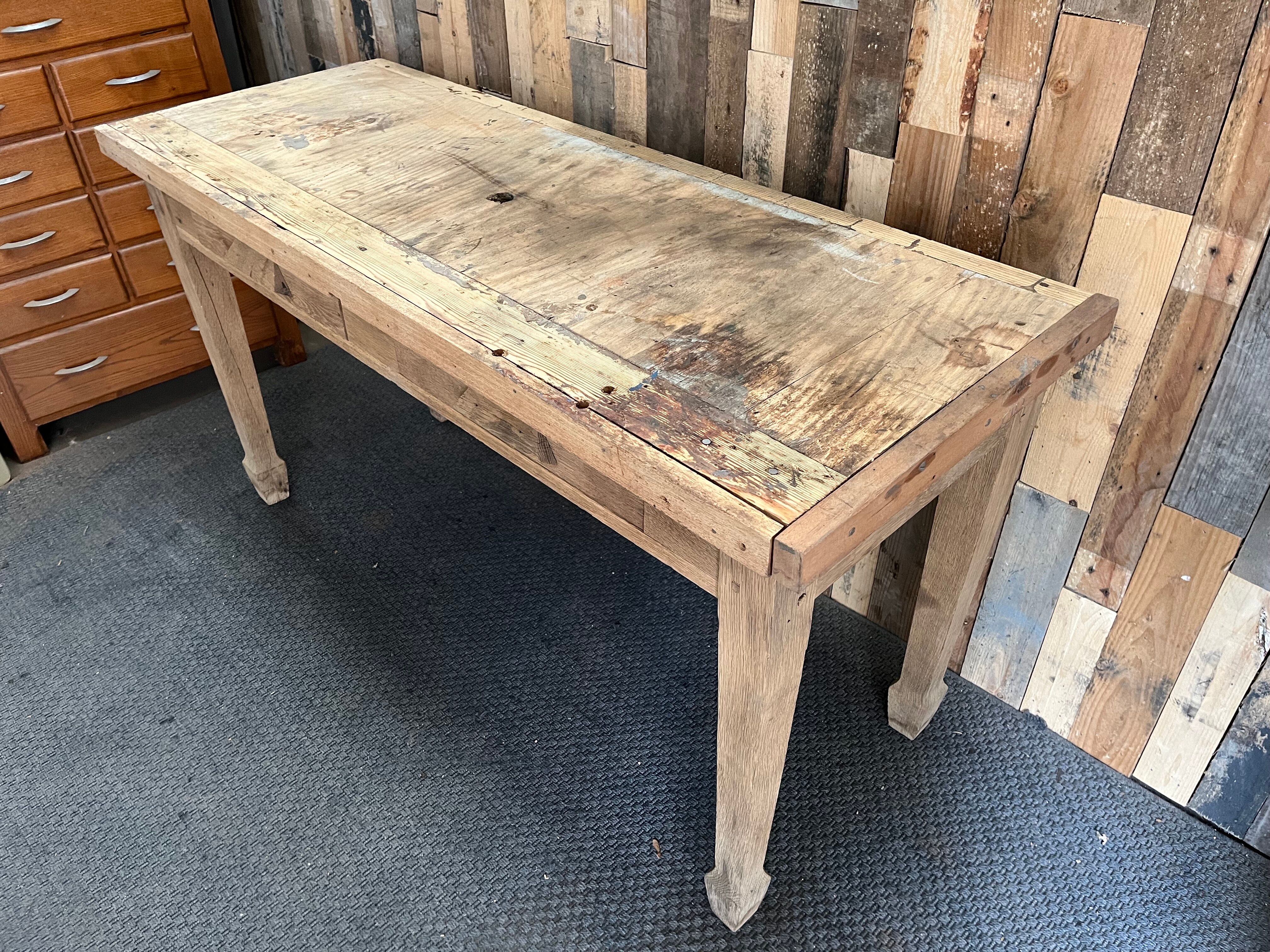 Farmhouse table with drawers in raw wood