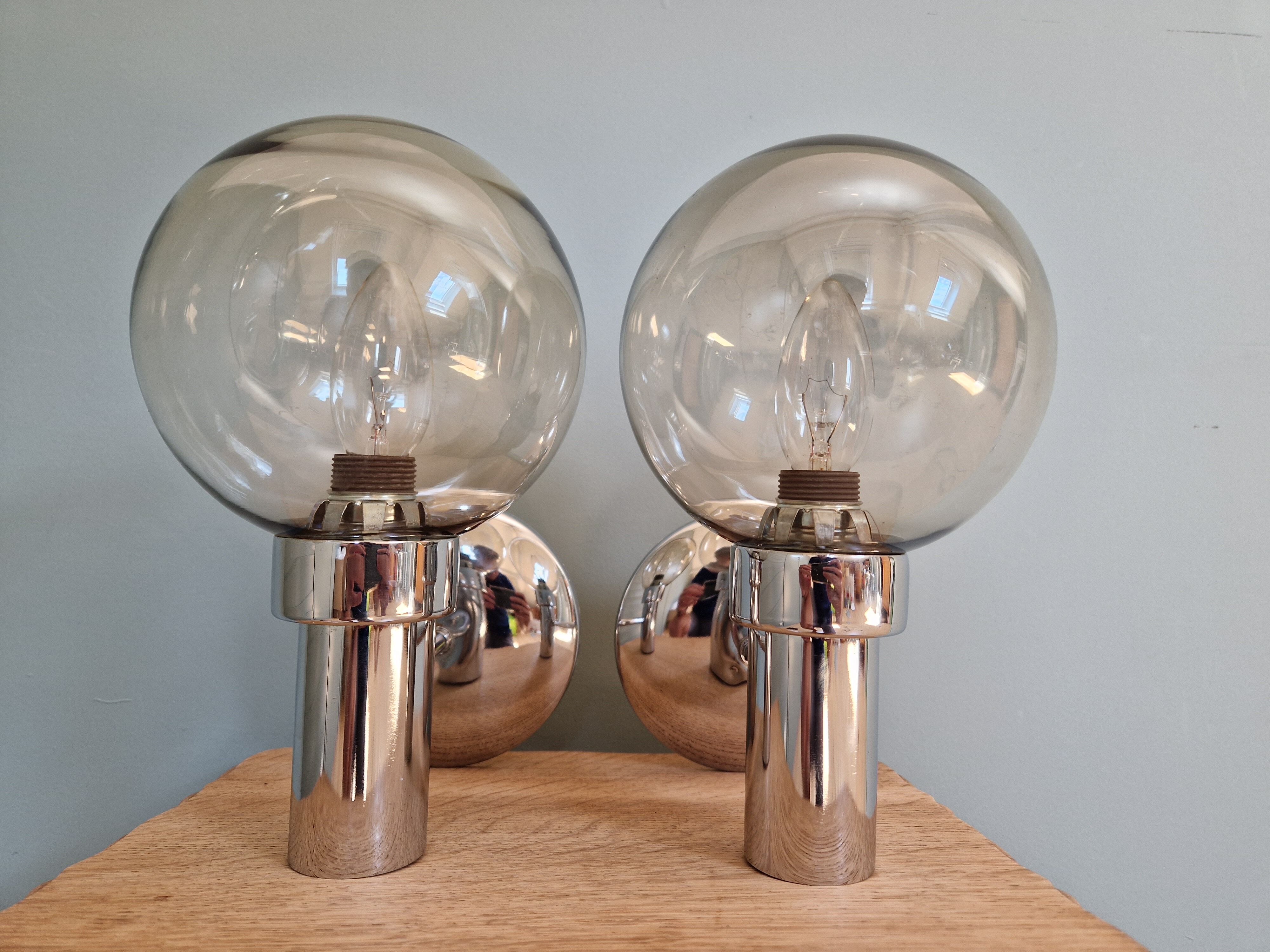 Pair of vintage wall lights in chromed metal and smoked glass, 70s
