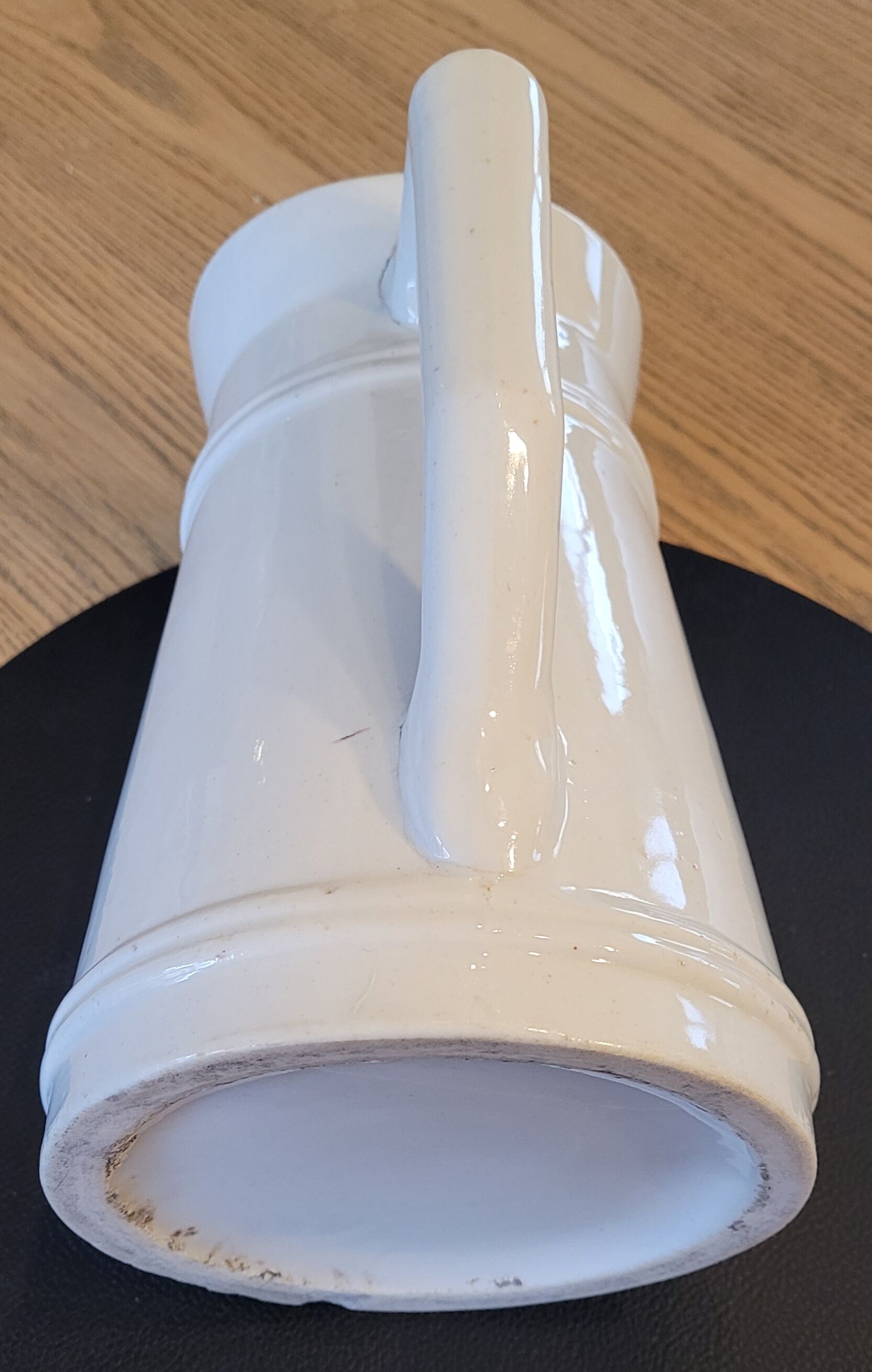 Cream glazed ceramic pitcher