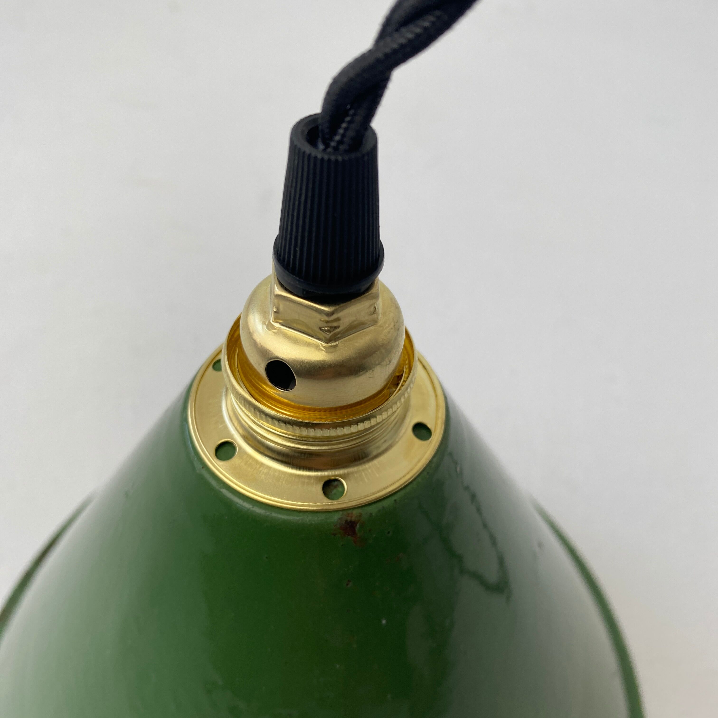 Old green enamelled conical industrial hanging lamp