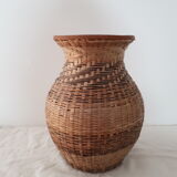 Vintage vase in sandstone and straw wicker