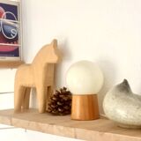 Pair of lamps with wooden base and glass globe, 1970s