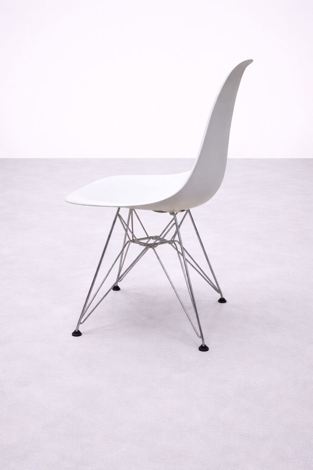 White DSR style Eames chair by Vitra with chrome Eiffel base.