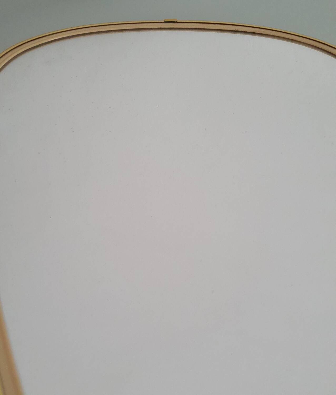 Vintage ovoid mirror with gold and black edges - 1960s