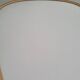 Vintage ovoid mirror with gold and black edges - 1960s