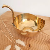 Empty brass apple pocket