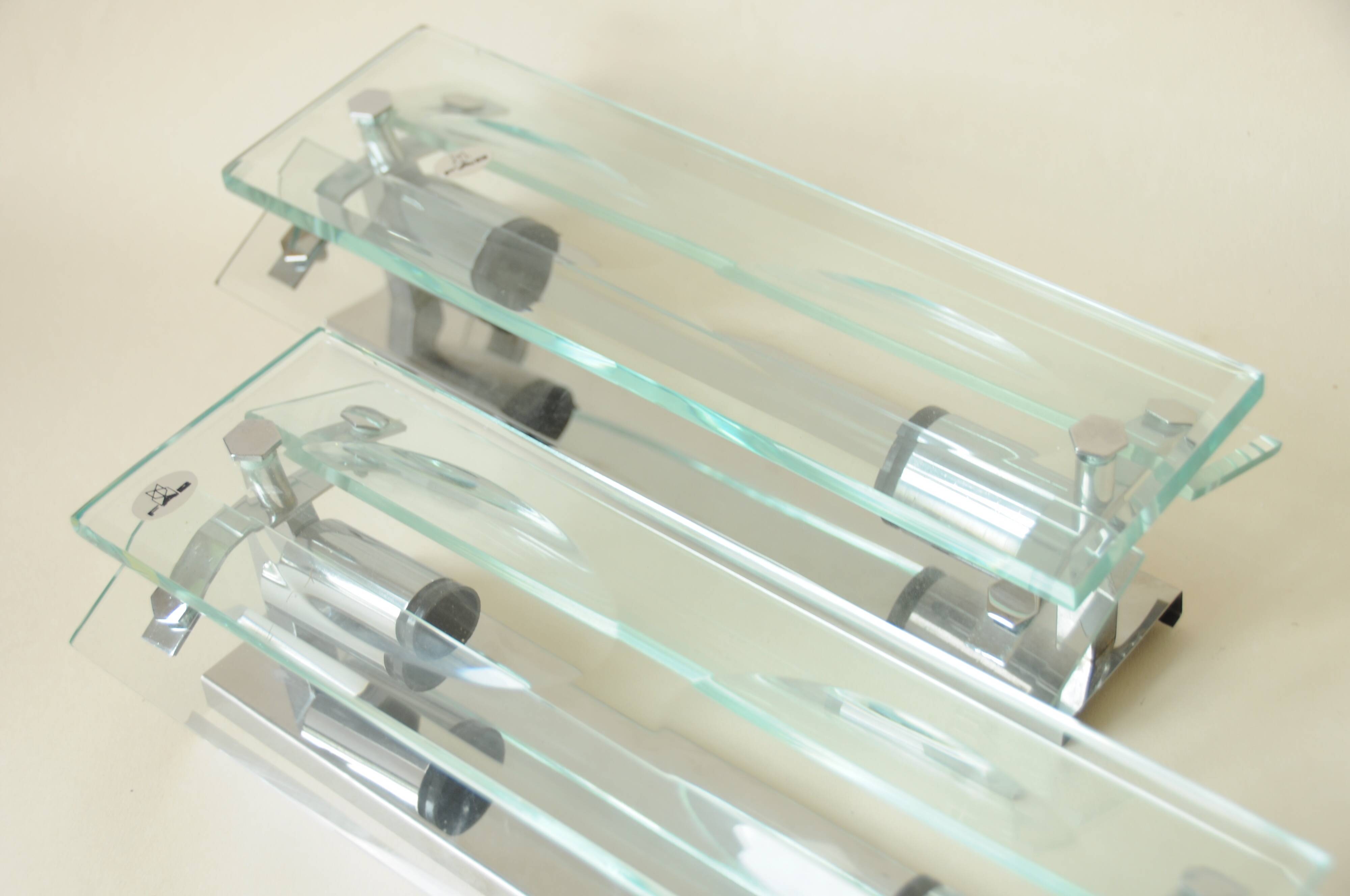 Pair of vintage glass and chrome wall sconces