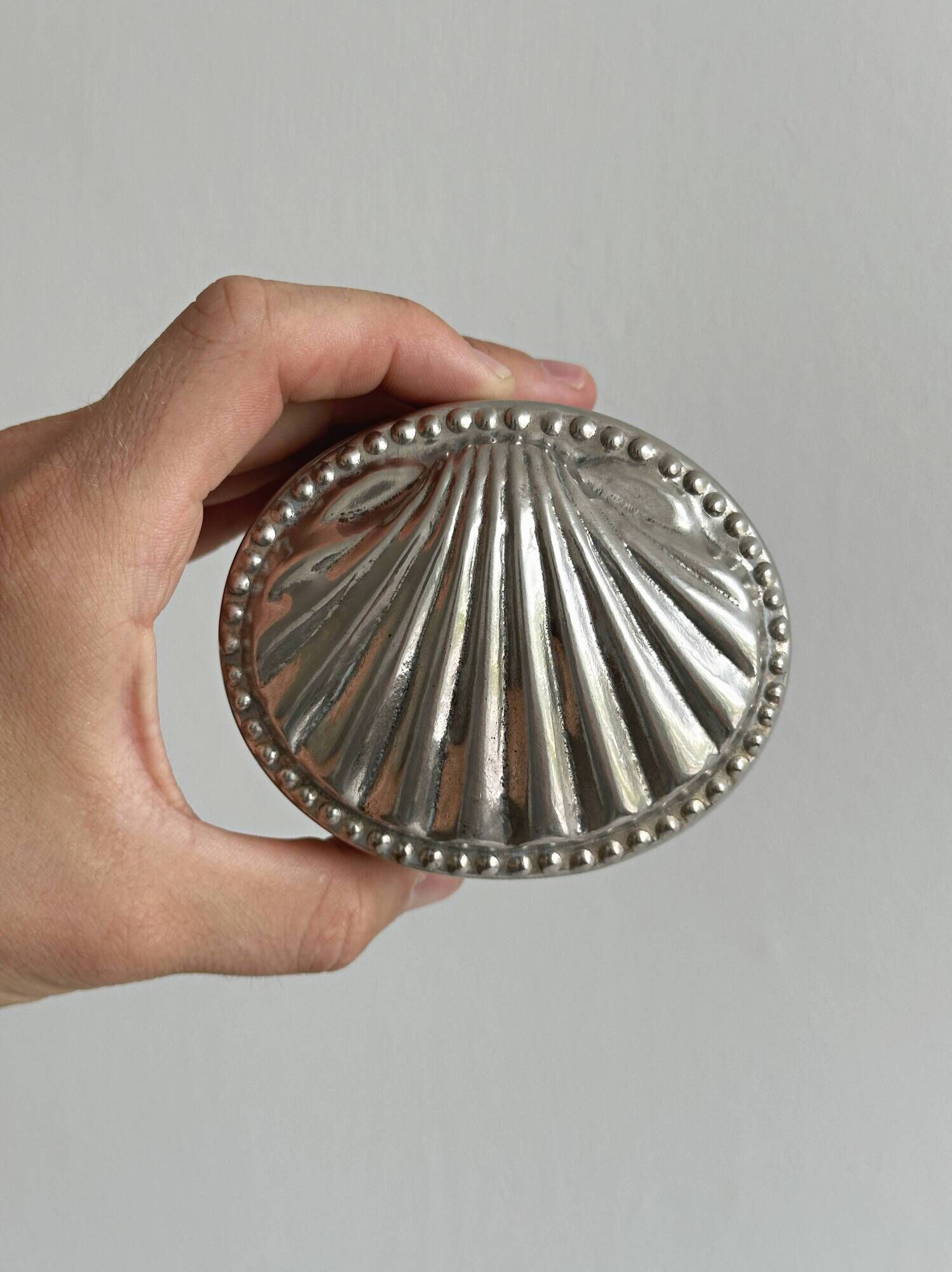 Silver-plated metal catchall with patina