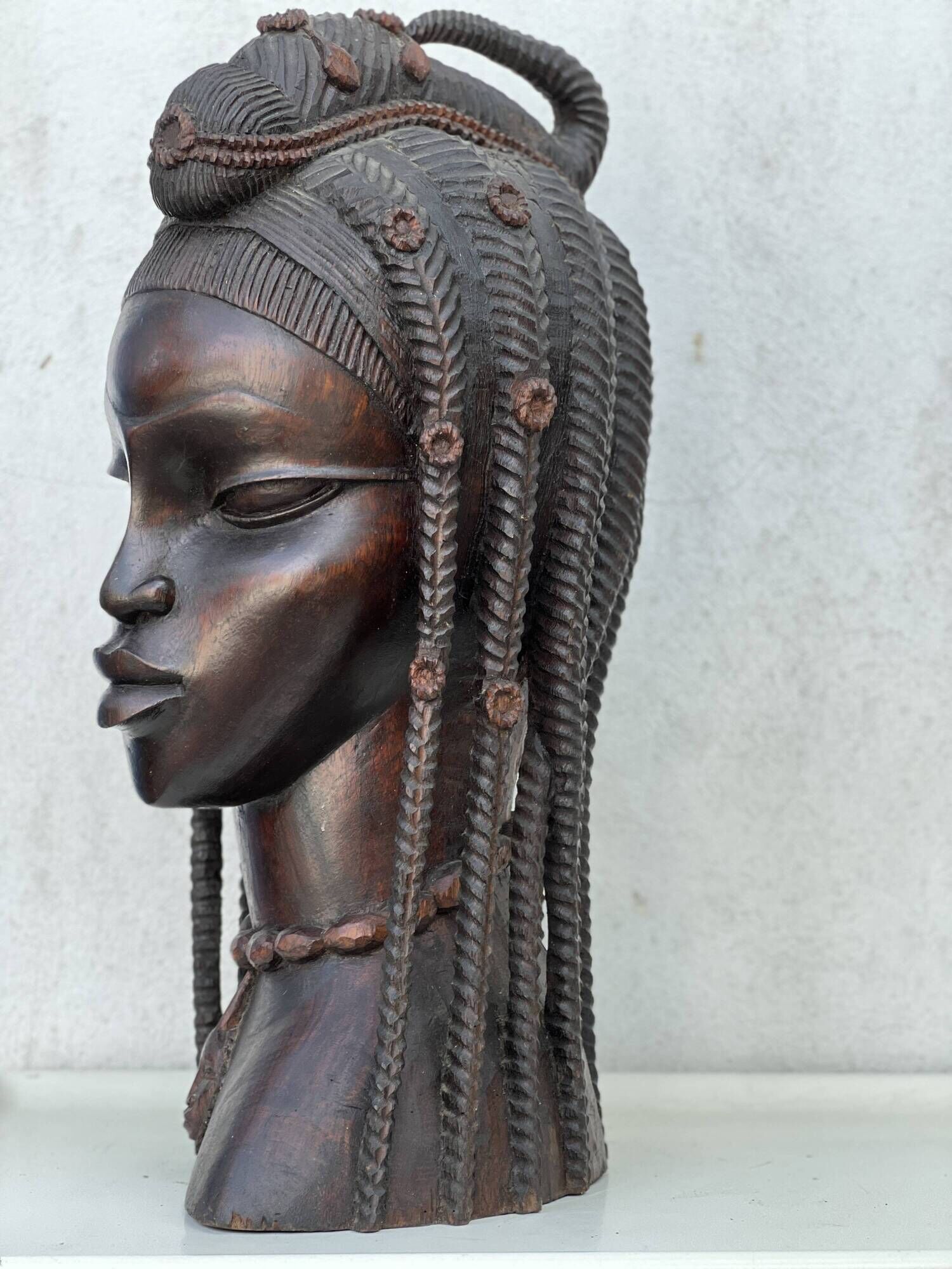 Large wooden bust of an African woman.