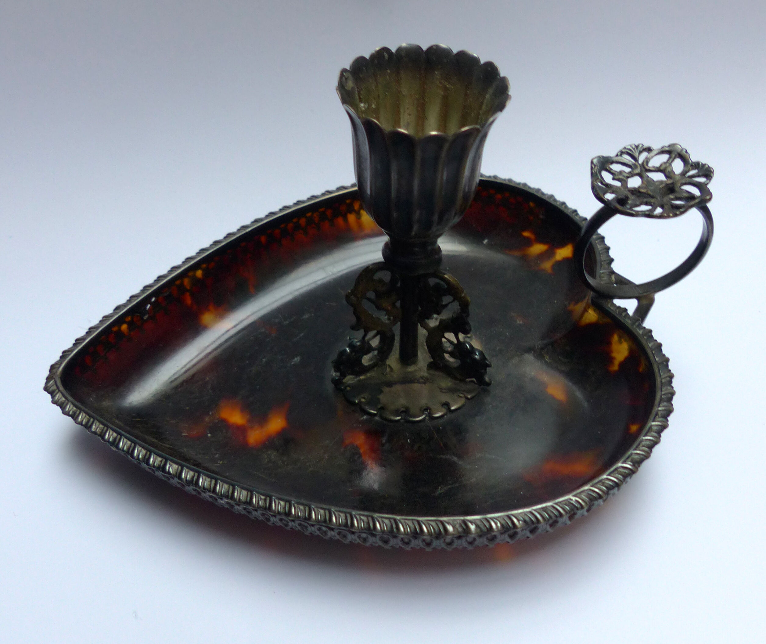 Scaled and silver table candle holder