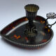 Scaled and silver table candle holder