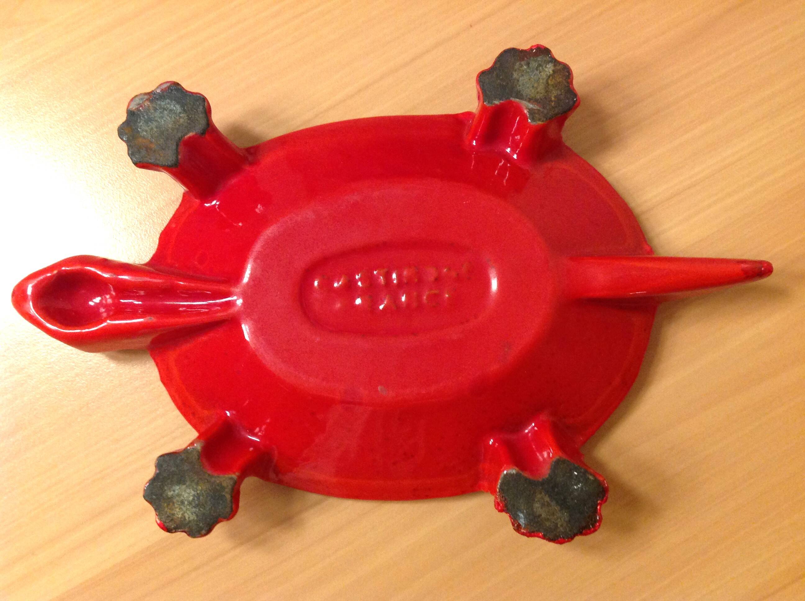 Turtle pocket emptier in enameled red cast iron by Castirone France
